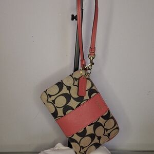 Coach Signature Wristlet in Coral and Tan